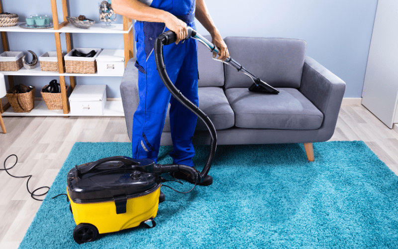 cleaning sofa with vaccum