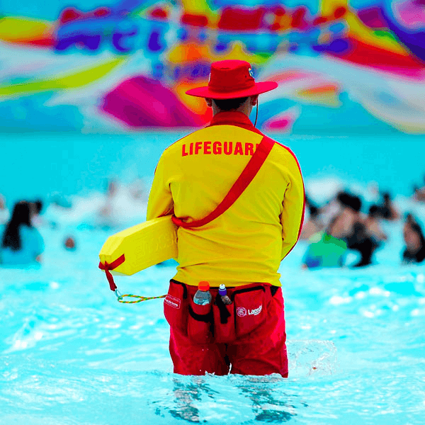 life guard doing his duty while people are swimming